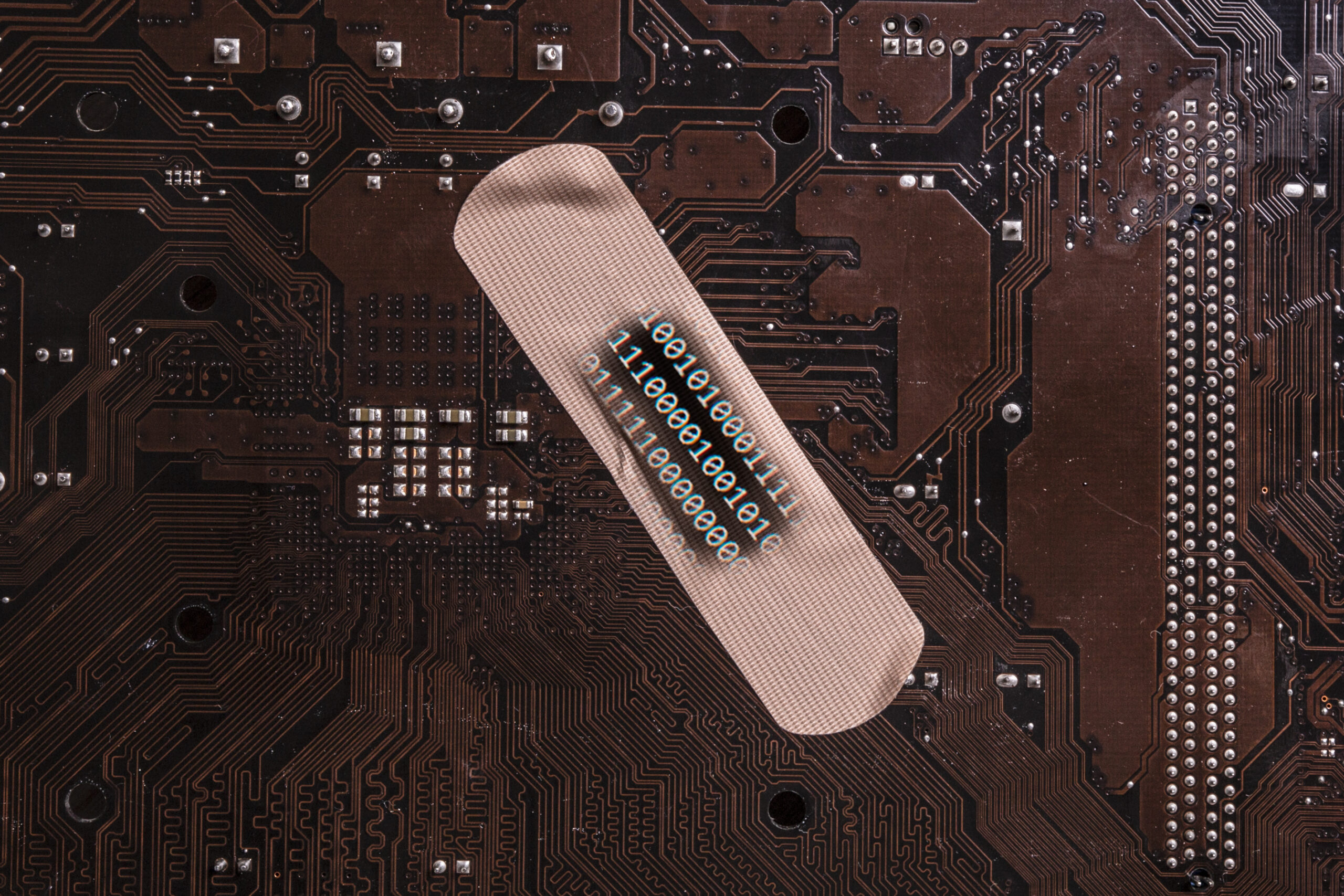 A temporary patch on a circuit board.