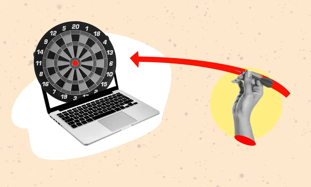 Dart striking the bullseye of a target mounted on a laptop screen - representing precise, accurate testing results
